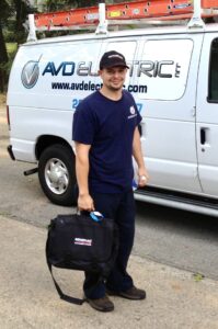 NJ Licensed Electrical Contractor - AVD Electric – Mahwah NJ Electrician Owner of AVD Electric wearing Generac hat